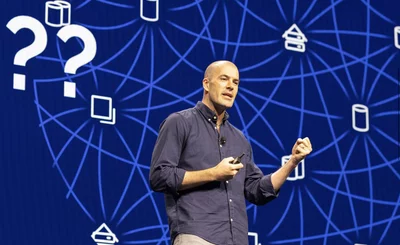 An image of Jay Kreps, Confluent CEO, on stage