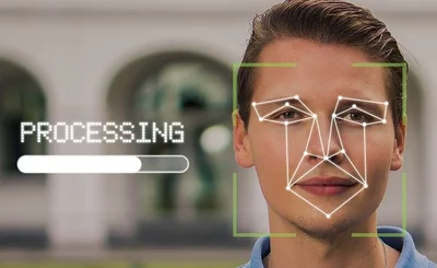 An image of someone’s face being scanned by facial recognition software