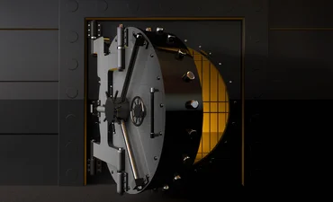 A round bank vault security door slightly open © DSGpro - Canva