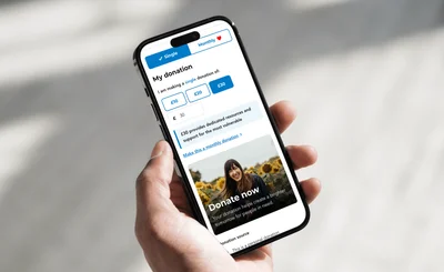 an image of someone donating money on the godonate platform