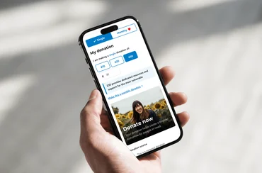 an image of someone donating money on the godonate platform