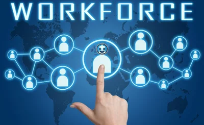 Finger touching AI agent icon in workforce network schematic on blue world map background