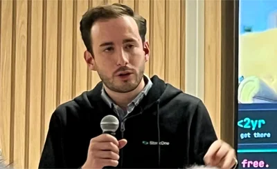 Close-up of Romain Sestier, StackOne, speaking at a SaaStock London event 2026-03