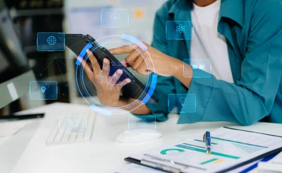 Hands holding iPad, using AI for accounting