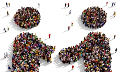 Large and diverse group of people seen from above gathered together in the shape of two friends shaking hands, social contract concept © Arthimedes - Shutterstock
