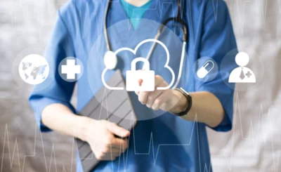 Doctor pushing button cloud lock security healthcare network on virtual panel management. © MaximP - Shutterstock