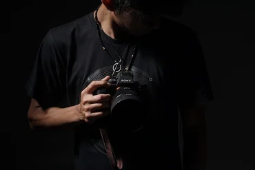 an image of someone holding a Sony camera