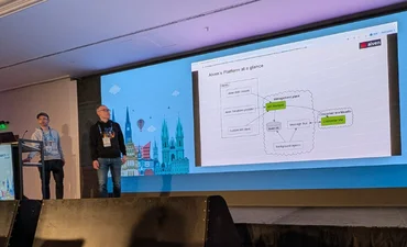 NAV's Hans Kristian Flaatten and Aiven's Dmitry Kan at OpenSearchCon 26 © AlyxMacQueen