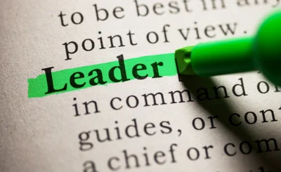 Dictionay page with definition of 'leader'