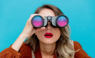 Young Teacher with Books and Binocular