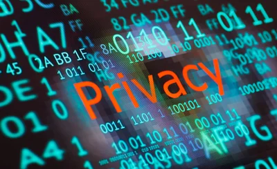 Pixelated eye with privacy written in the centre, surrounded by code. 