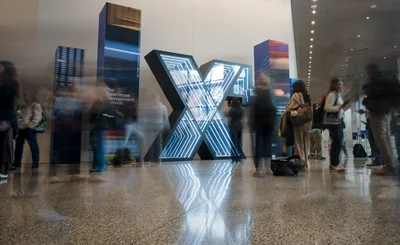 an image of the Qualtrics X4 Summit Sign 